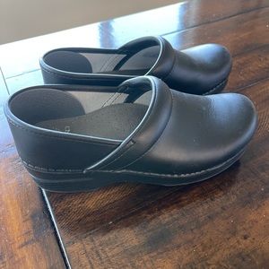 Excellent Used one time Dansko Clogs.